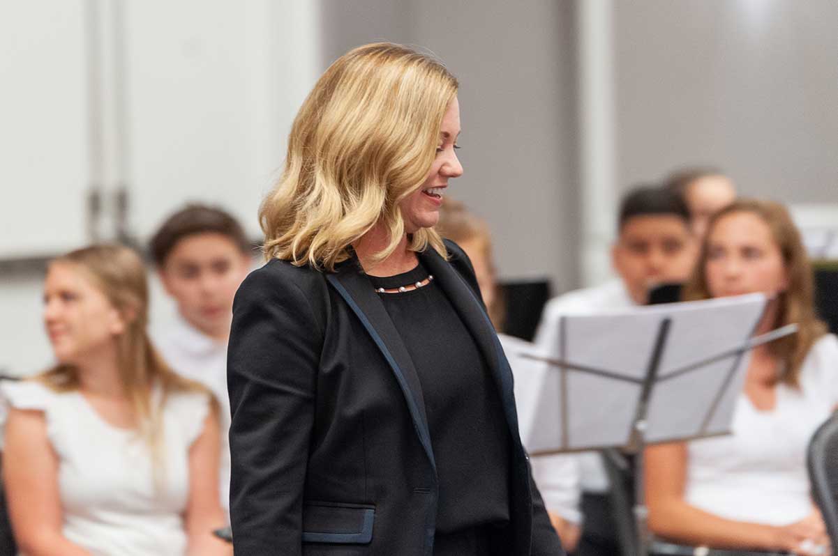 Erin Cole conducting at the Kansas Bandmasters Association.